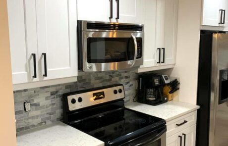 Luxury kitchen remodel with custom cabinetry and a large center island.